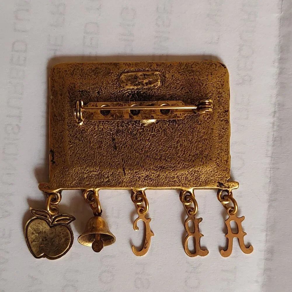 VTG Gold Tone Metal Enamel Teacher School ABC Apple Bell Chalk Eraser Brooch